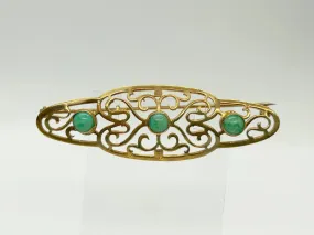 Elegant 1920s Art Deco Brooch with Green Stones