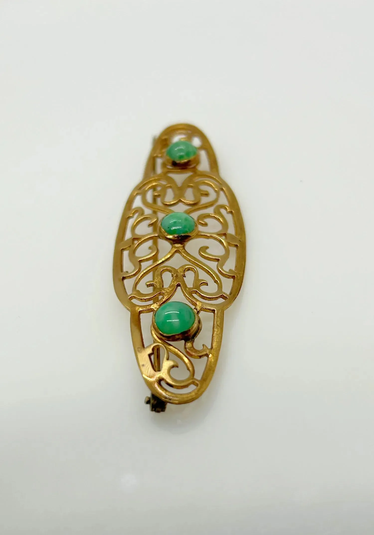 Elegant 1920s Art Deco Brooch with Green Stones