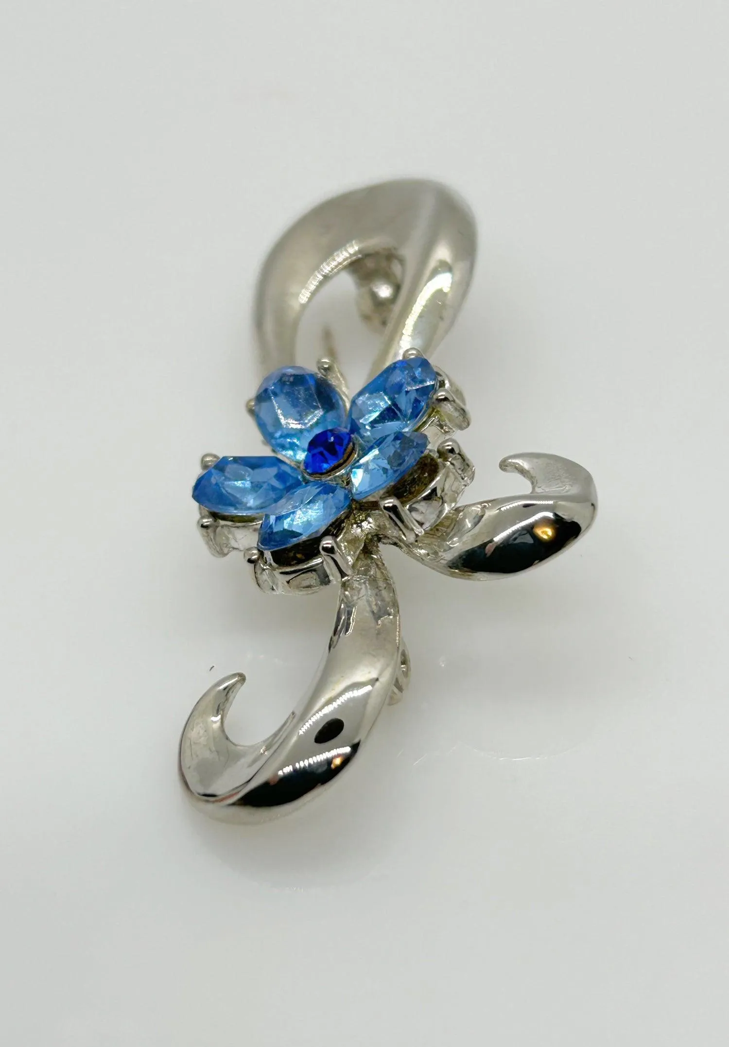 Vintage Silver Bow Brooch with Blue Stones