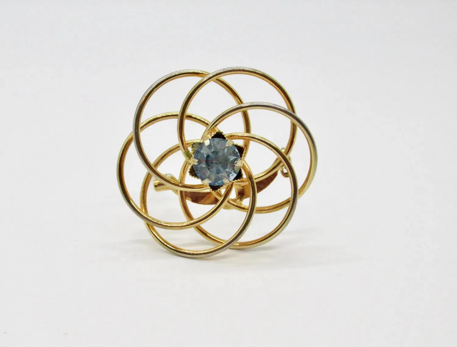 Vintage Swirl Brooch with Blue Rhinestone Center